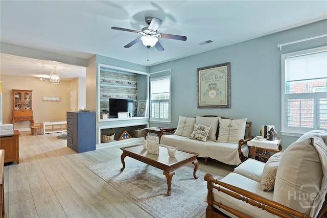 137 Regency Cir, Pooler, GA 31322 - living area featuring light wood-style flooring and ceiling fan