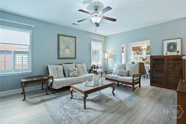 137 Regency Cir, Pooler, GA 31322 - living area featuring healthy amount of natural light, light wood-type flooring, and ceiling fan
