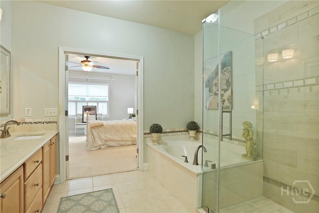 137 Regency Cir, Pooler, GA 31322 - ensuite bathroom with vanity, a bath, a shower stall, tile patterned floors, and ceiling fan