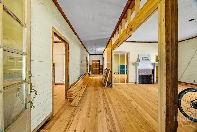 438 Kessler Loop, Guyton, GA 31312 - hallway featuring wood-type flooring and wooden walls