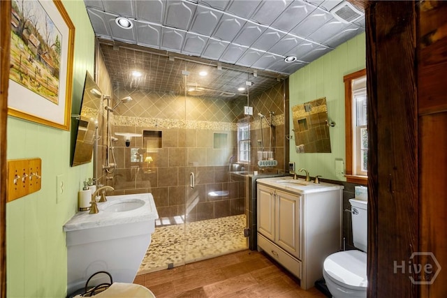 438 Kessler Loop, Guyton, GA 31312 - full bath with a stall shower, wood finished floors, and vanity