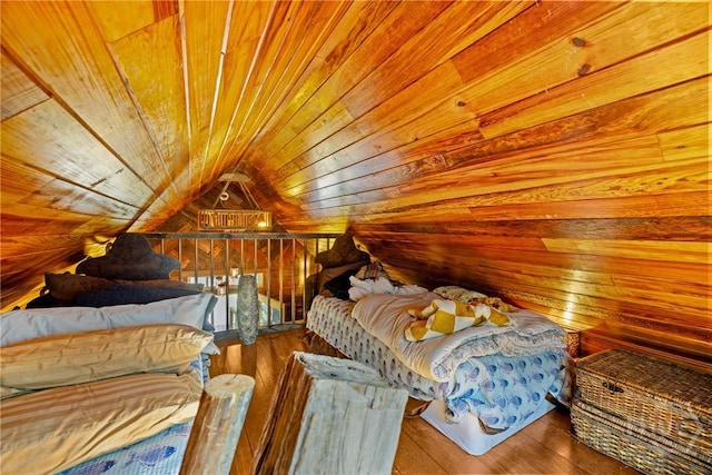 438 Kessler Loop, Guyton, GA 31312 - bedroom with wood ceiling, lofted ceiling, wood walls, and hardwood / wood-style floors