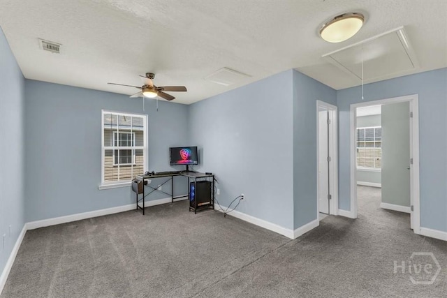 1237 Cypress Fall Cir, Hinesville, GA 31313 - carpeted empty room featuring attic access, plenty of natural light, and ceiling fan