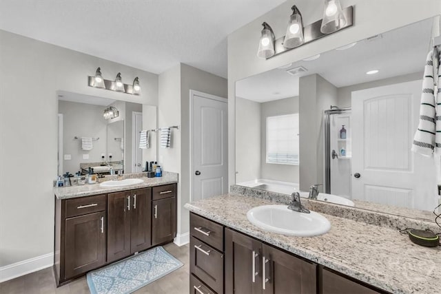 1237 Cypress Fall Cir, Hinesville, GA 31313 - full bathroom with vanity, a shower stall, and a bath