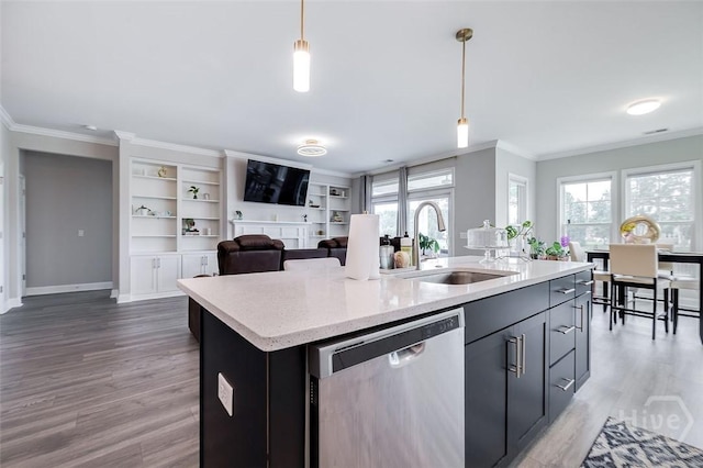 127 Champlain Dr, Pooler, GA 31322 - kitchen with stainless steel dishwasher, light wood finished floors, crown molding, a kitchen island with sink, and hanging light fixtures