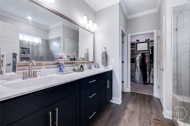127 Champlain Dr, Pooler, GA 31322 - full bathroom with double vanity, walk in shower, wood finished floors, a spacious closet, and crown molding