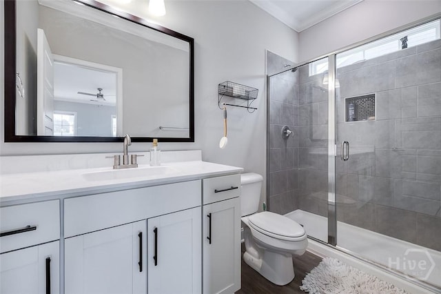 127 Champlain Dr, Pooler, GA 31322 - bathroom with ornamental molding, vanity, a shower stall, wood finished floors, and a ceiling fan
