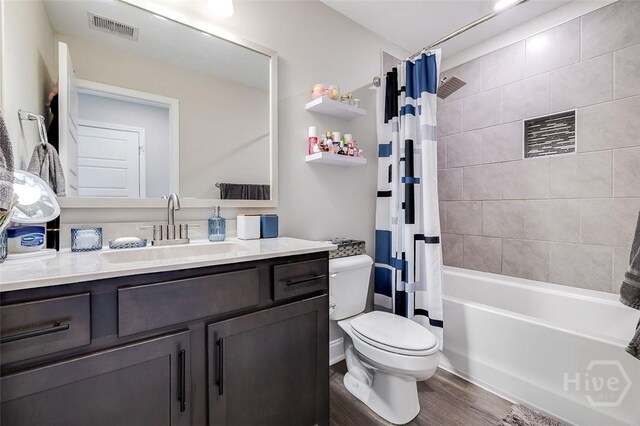 127 Champlain Dr, Pooler, GA 31322 - full bathroom featuring vanity, wood finished floors, and shower / bath combination with curtain