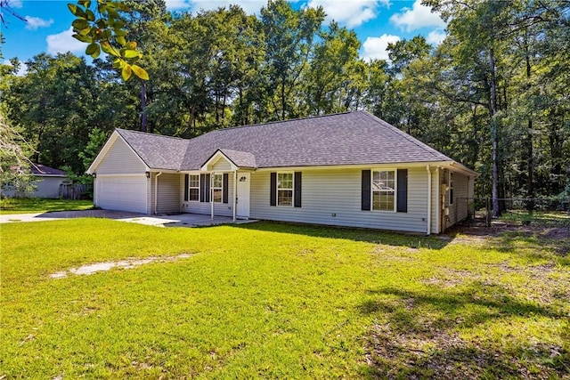 166 Old Sunbury Trl, Midway, GA 31320 - ranch-style house featuring a garage, a shingled roof, and driveway