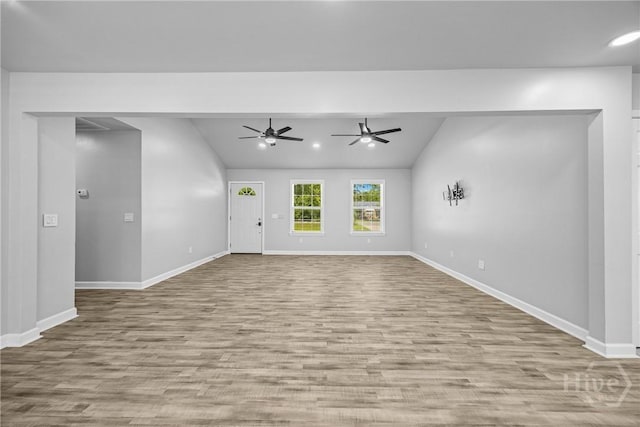 166 Old Sunbury Trl, Midway, GA 31320 - unfurnished living room featuring lofted ceiling, a ceiling fan, wood finished floors, and recessed lighting