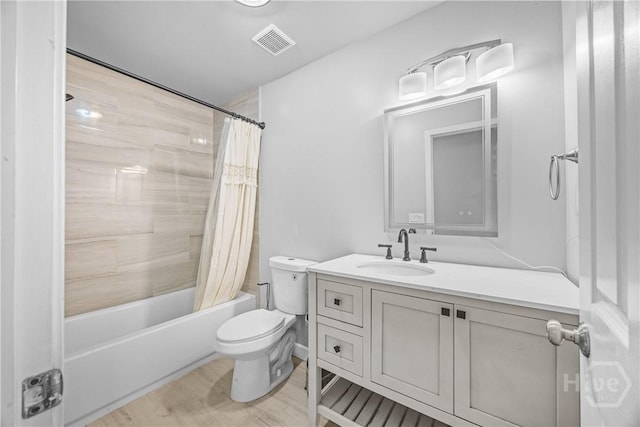 166 Old Sunbury Trl, Midway, GA 31320 - bathroom with shower / tub combo with curtain, vanity, and wood finished floors