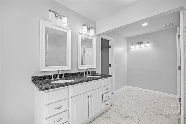 166 Old Sunbury Trl, Midway, GA 31320 - full bathroom with marble finish flooring, double vanity, and recessed lighting