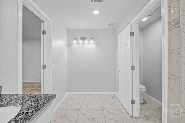 166 Old Sunbury Trl, Midway, GA 31320 - bathroom with marble look tiles and vanity