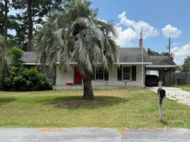 432 Cliff Dr, Pooler, GA 31322 - view of front of property featuring driveway, brick siding, and a carport