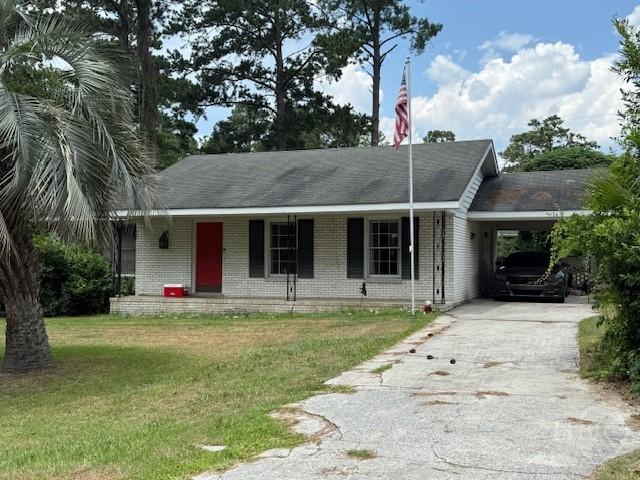 432 Cliff Dr, Pooler, GA 31322 - ranch-style home featuring covered porch, brick siding, driveway, a front yard, and an attached carport