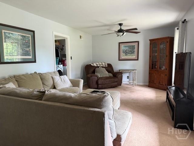 432 Cliff Dr, Pooler, GA 31322 - living room featuring light colored carpet, a ceiling fan, and washer / clothes dryer