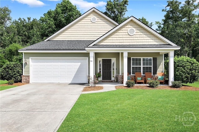 80 Sunbury Ct, Richmond Hill, GA 31324 - craftsman-style house with covered porch, a garage, a shingled roof, concrete driveway, and a front lawn