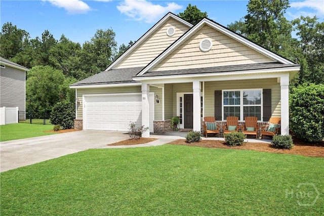 80 Sunbury Ct, Richmond Hill, GA 31324 - view of front of home featuring covered porch, driveway, an attached garage, a shingled roof, and brick siding