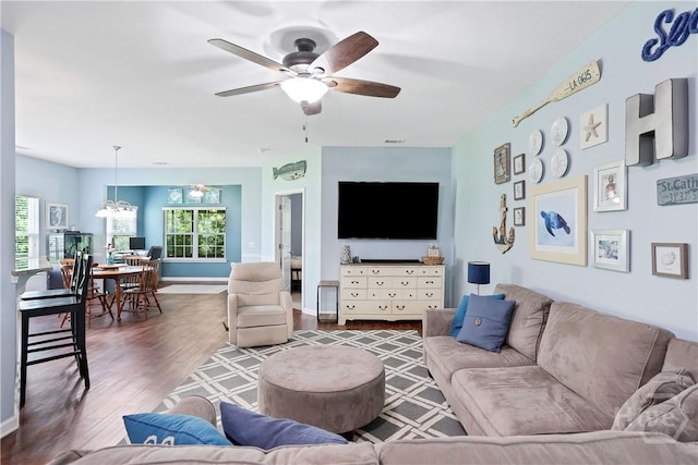 80 Sunbury Ct, Richmond Hill, GA 31324 - living room featuring a ceiling fan and wood finished floors