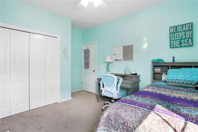 80 Sunbury Ct, Richmond Hill, GA 31324 - bedroom with carpet, a closet, and a ceiling fan
