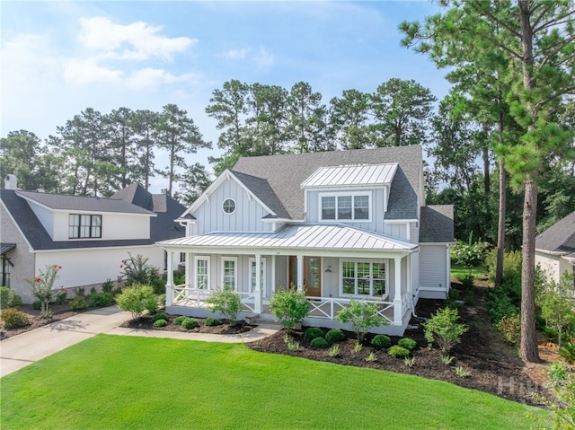 122 Kent, Pooler, GA 31322 - modern farmhouse featuring covered porch, a standing seam roof, a front yard, board and batten siding, and a metal roof