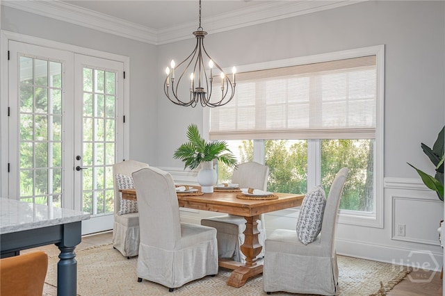 122 Kent, Pooler, GA 31322 - dining room with french doors, a chandelier, crown molding, wainscoting, and light wood-type flooring