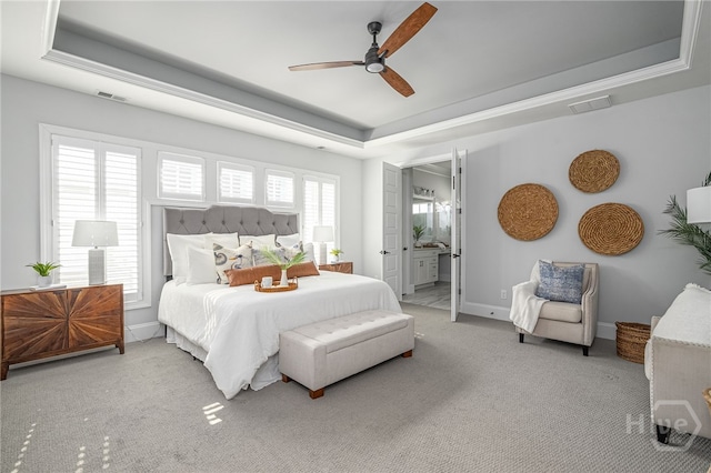 122 Kent, Pooler, GA 31322 - carpeted bedroom featuring a tray ceiling, ceiling fan, and ensuite bath