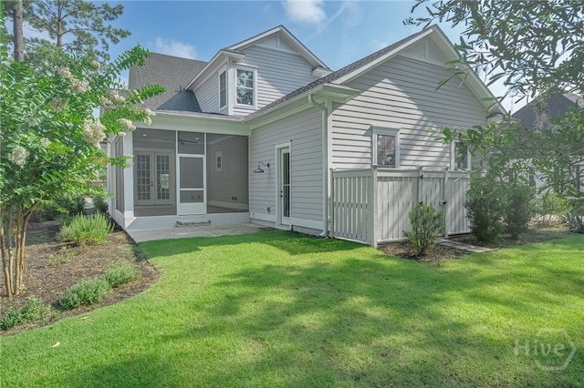 122 Kent, Pooler, GA 31322 - rear view of house featuring a sunroom and a lawn
