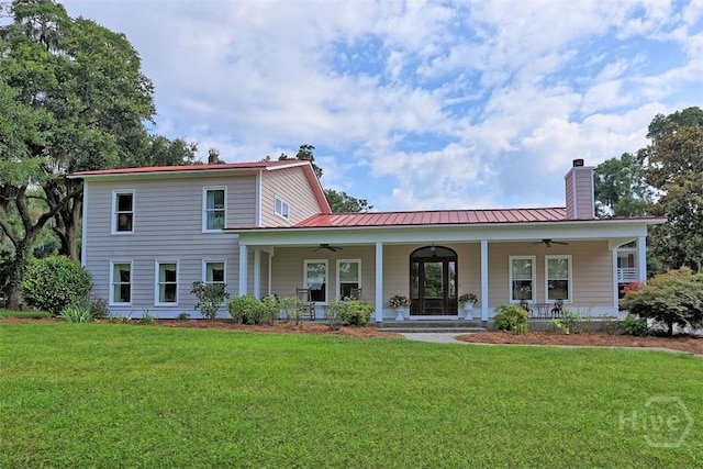 606 Rivers End Dr, Savannah, GA 31406 - back of house with a ceiling fan, a porch, and a lawn