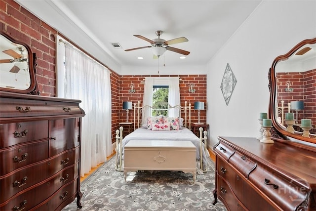606 Rivers End Dr, Savannah, GA 31406 - bedroom featuring brick wall and a ceiling fan