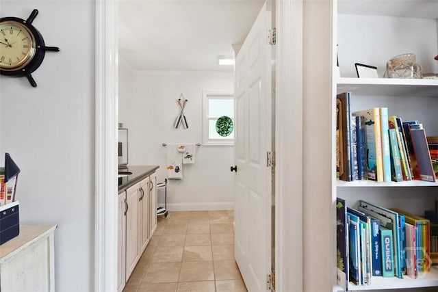 606 Rivers End Dr, Savannah, GA 31406 - interior space with light tile patterned flooring and ornamental molding
