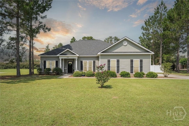 202 Orleans Trl, Statesboro, GA 30461 - view of front of property with a front lawn and a shingled roof