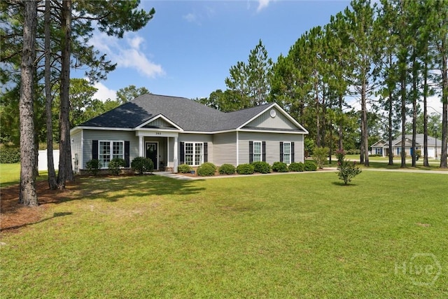 202 Orleans Trl, Statesboro, GA 30461 - view of front of house with a front lawn and a shingled roof