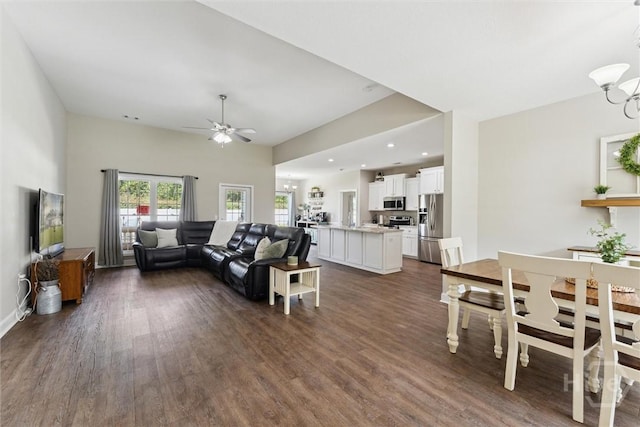 202 Orleans Trl, Statesboro, GA 30461 - living room with a chandelier, dark wood-type flooring, a ceiling fan, and recessed lighting