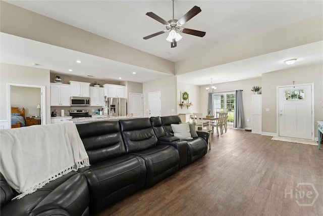 202 Orleans Trl, Statesboro, GA 30461 - living room featuring ceiling fan, wood finished floors, recessed lighting, and a chandelier