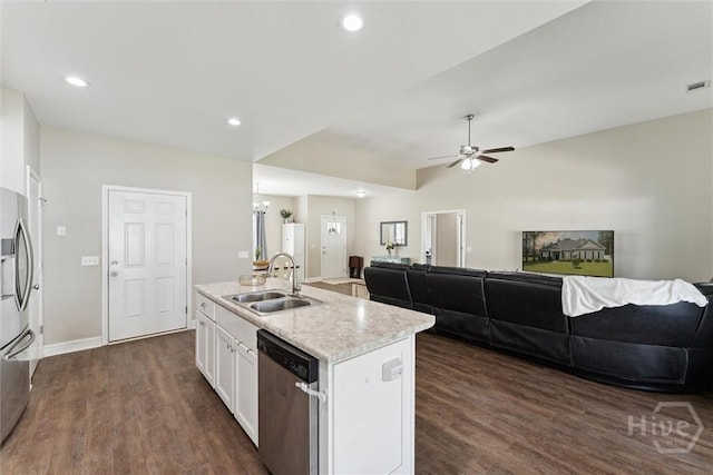 202 Orleans Trl, Statesboro, GA 30461 - kitchen featuring appliances with stainless steel finishes, open floor plan, white cabinetry, a kitchen island with sink, and dark wood finished floors