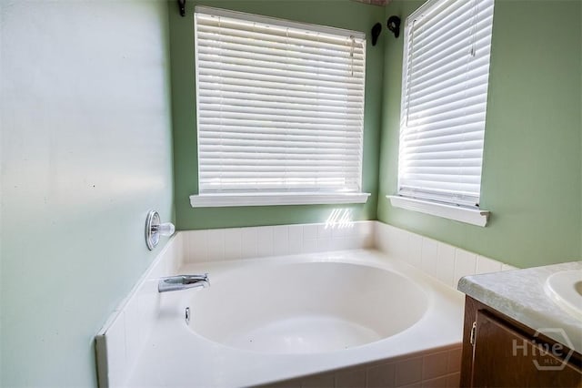 225 Jasper Ln, Rincon, GA 31326 - full bathroom featuring a garden tub and vanity