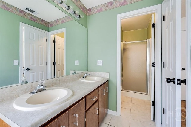 225 Jasper Ln, Rincon, GA 31326 - full bath featuring tile patterned flooring, a stall shower, and double vanity