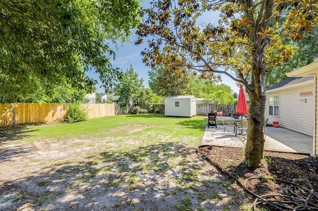 225 Jasper Ln, Rincon, GA 31326 - fenced backyard featuring a shed and a patio