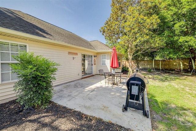 225 Jasper Ln, Rincon, GA 31326 - fenced backyard featuring a patio area