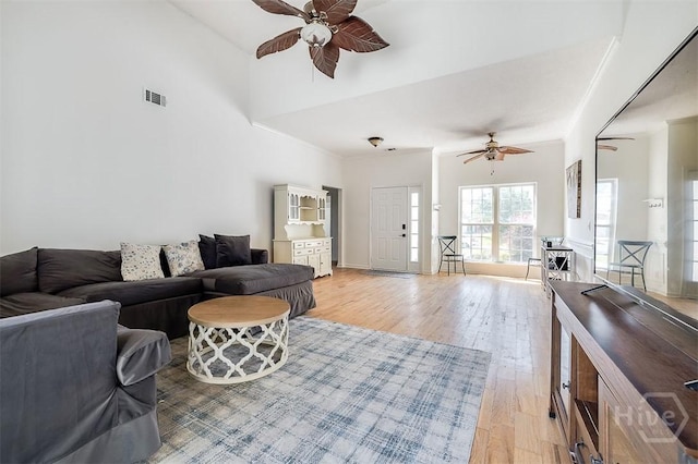 225 Jasper Ln, Rincon, GA 31326 - living area with ceiling fan, light wood-type flooring, and a high ceiling