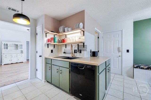 225 Jasper Ln, Rincon, GA 31326 - kitchen featuring black dishwasher, light countertops, light tile patterned floors, decorative backsplash, and open shelves
