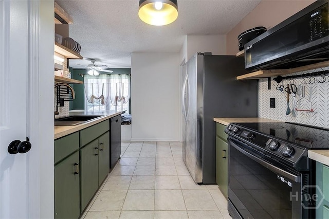 225 Jasper Ln, Rincon, GA 31326 - kitchen with green cabinetry, black appliances, light countertops, a ceiling fan, and a textured ceiling