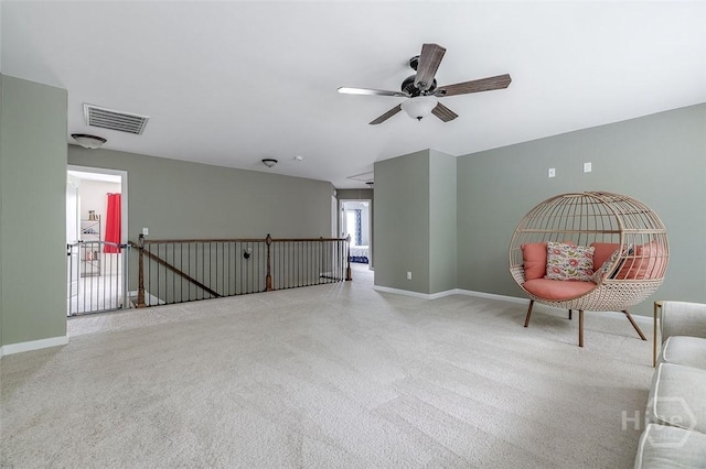 121 Cypress Loop, Bloomingdale, GA 31302 - unfurnished room featuring ceiling fan, carpet floors, and an upstairs landing