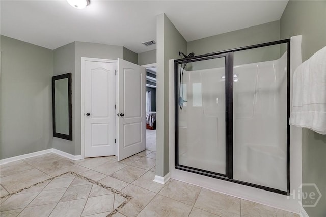 121 Cypress Loop, Bloomingdale, GA 31302 - bathroom with a stall shower and tile patterned flooring