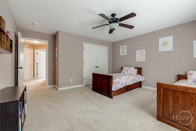 121 Cypress Loop, Bloomingdale, GA 31302 - bedroom featuring light colored carpet, a closet, and a ceiling fan