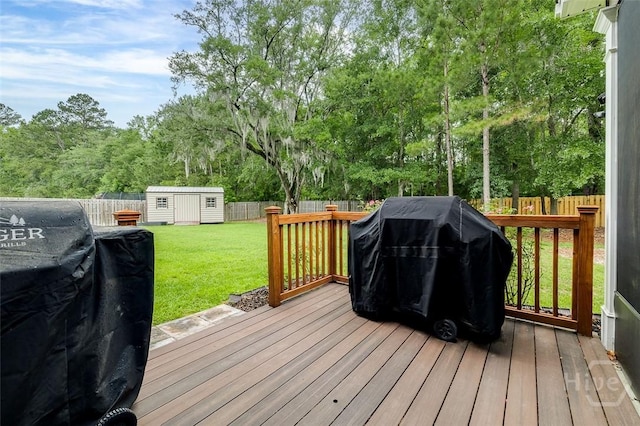 121 Cypress Loop, Bloomingdale, GA 31302 - deck with area for grilling, a fenced backyard, and a shed