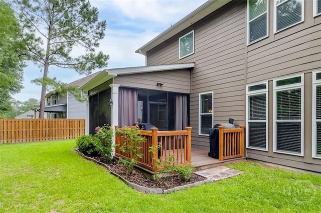 121 Cypress Loop, Bloomingdale, GA 31302 - back of property with a sunroom and a deck