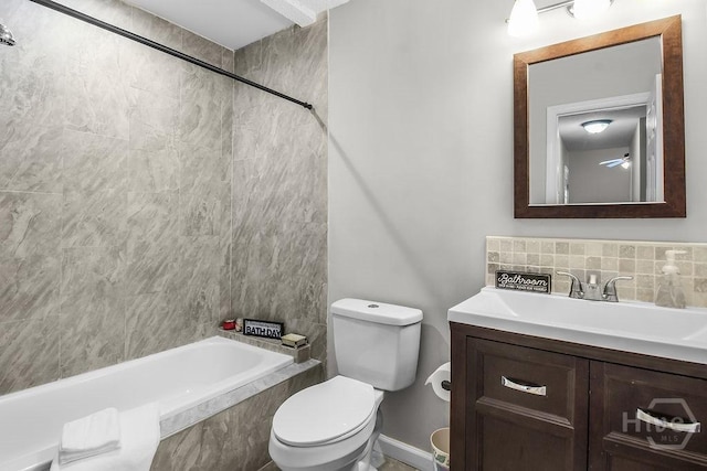 213 Executive Park Dr, Savannah, GA 31406 - bathroom with vanity, tiled shower / bath, and tasteful backsplash