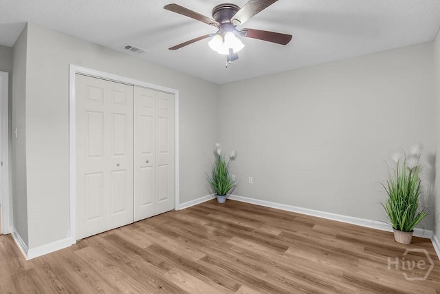 213 Executive Park Dr, Savannah, GA 31406 - unfurnished bedroom with light wood-type flooring, a closet, and ceiling fan